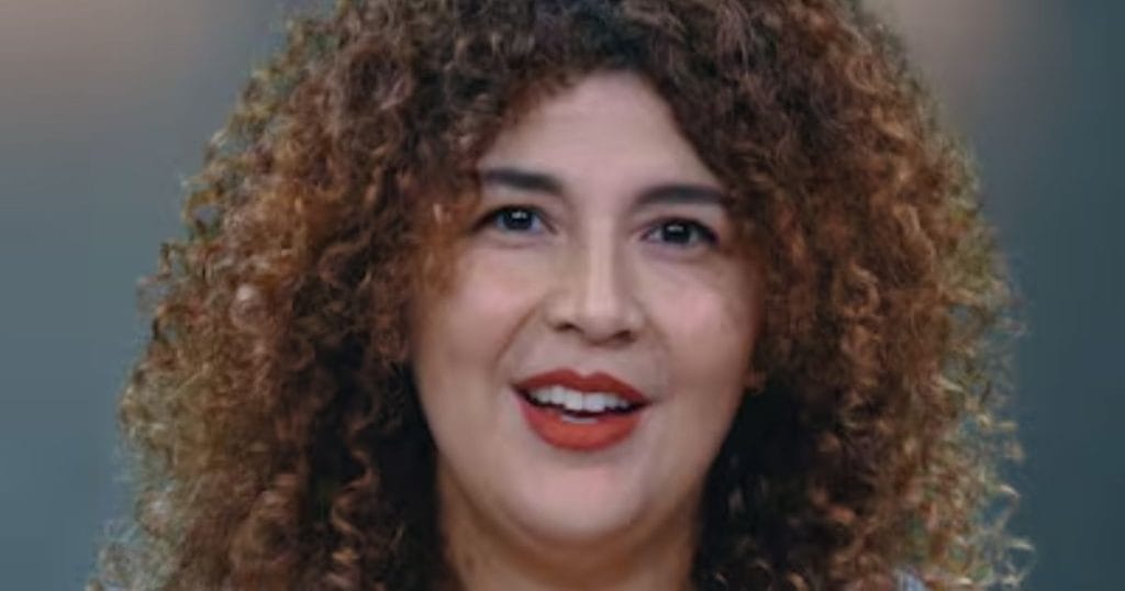 Smiling Emirati woman with glossy hair