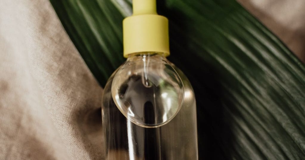 Castor oil in a glass bottle for hair
